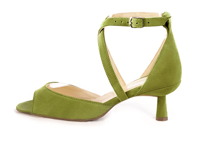 Pistachio green women's closed back sandals, with crossed straps. Square toe. Medium spool heels. Profile view - Florence KOOIJMAN
